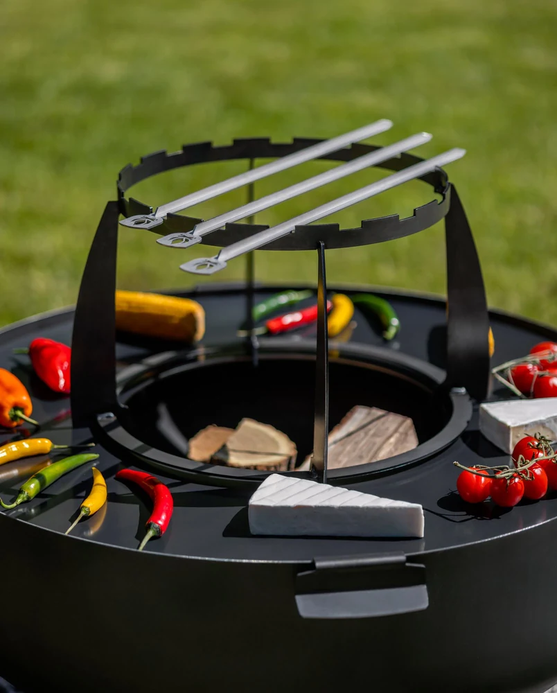 Vegetables on a rotating grate in a COOK KING fire bowl